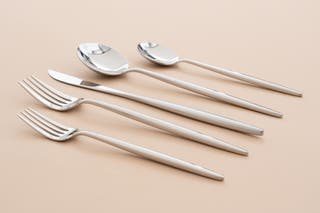 The Crate and Barrel Aero Mirror Flatware Set.