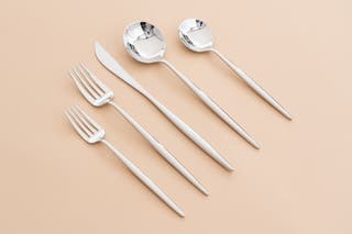 The Crate and Barrel Aero Mirror Flatware Set.