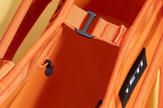 A close up of the Yeti Camino 35 Carryall clasp and zippered internal pockets