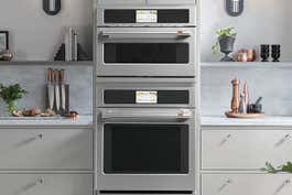 The GE wall oven shown in a display kitchen in its stainless steel double-oven variation.