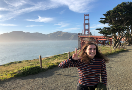 Gaby poses near the Golden Gate Bridge