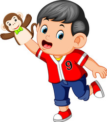 boy was using monkey puppet vector image