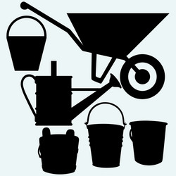 garden wheelbarrow watering can and buckets vector image