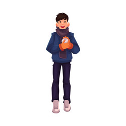 handsome young man making a snowball vector image