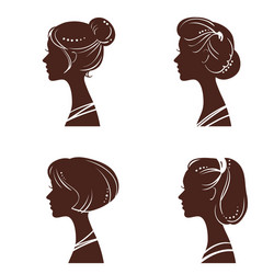 Four silhouettes of women vector