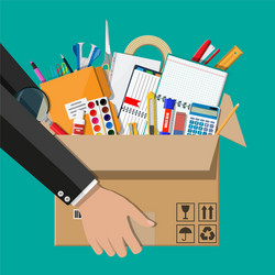 office accessories in cardboard box hand vector image