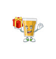 mug beer cartoon mascot with a red box gift vector image