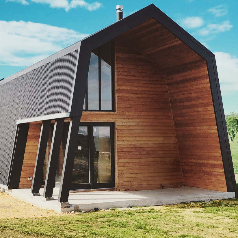 Two story house with timber facade