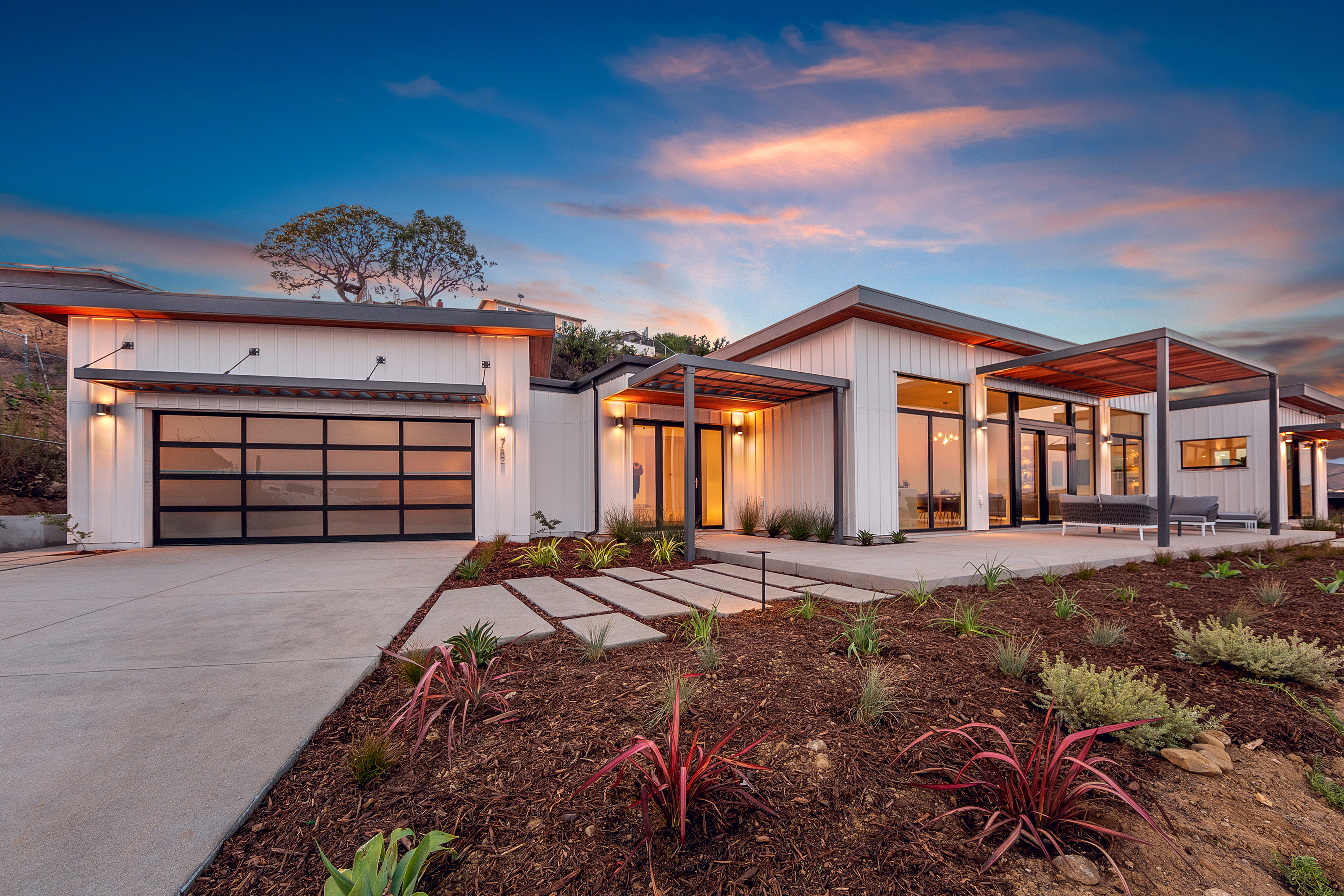 Single-story house with a garage and covered entrance.