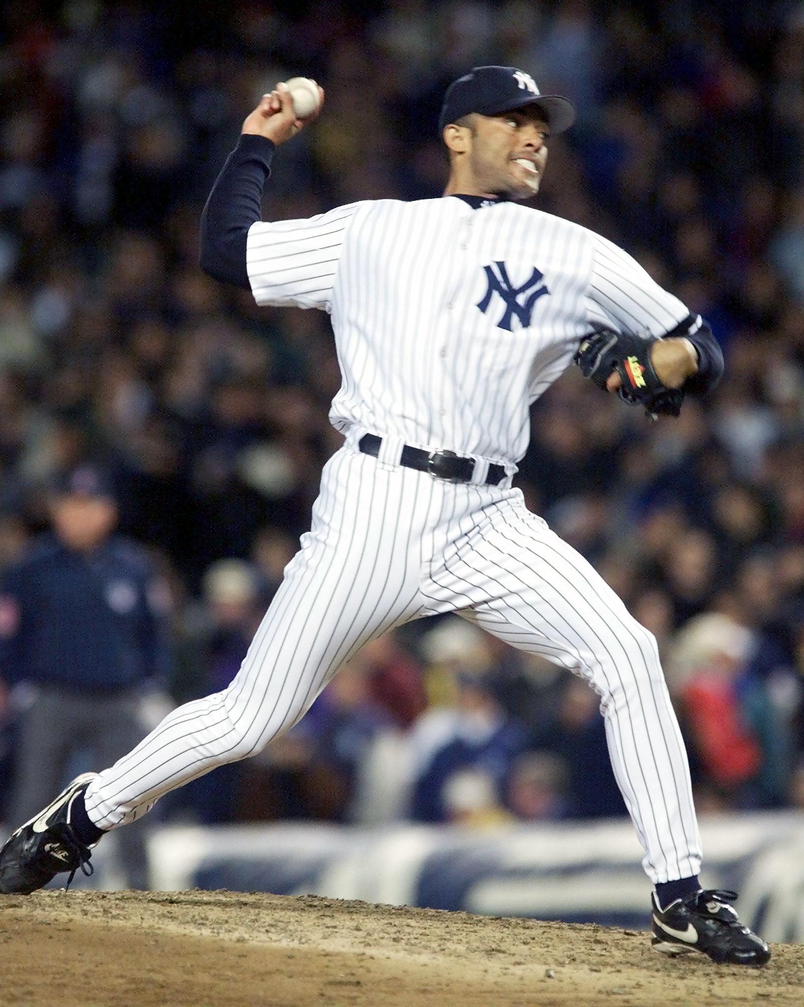New York Yankees pitcher Mariano Rivera pitches in