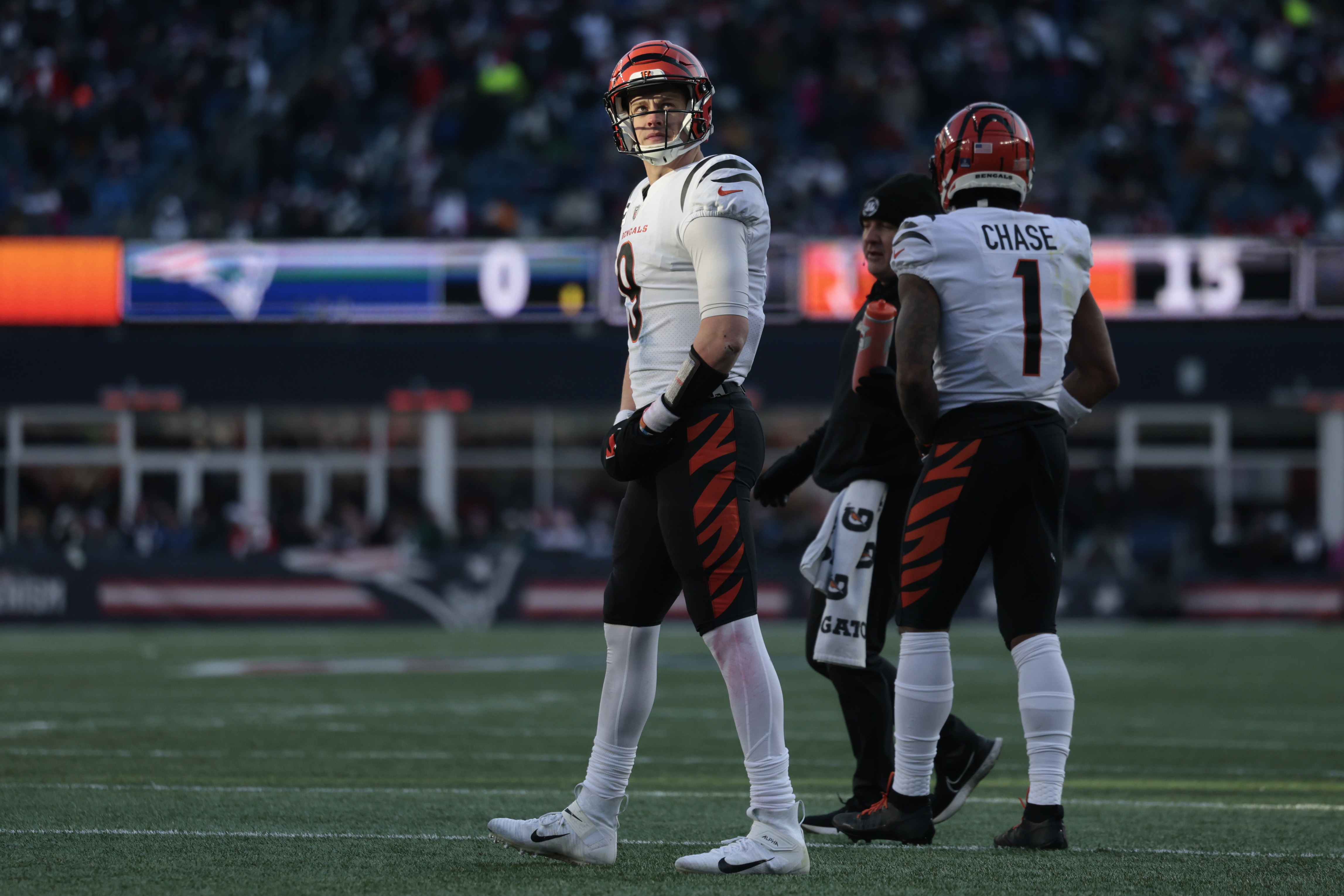 Joe Burrow #9 of the Cincinnati Bengals looks during the second quarter against the New England Patriots at Gillette Stadium on December 24, 2022 in Foxborough, Massachusetts.