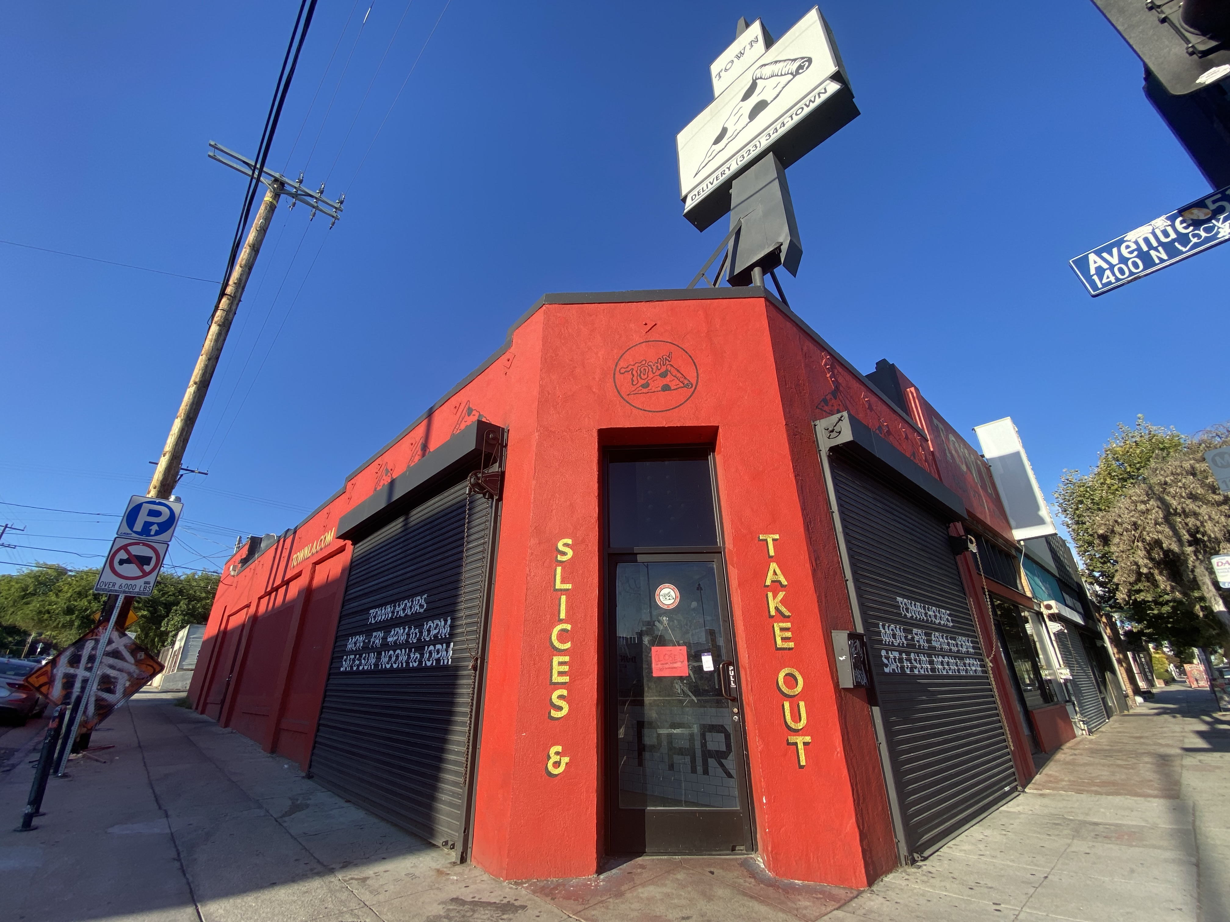 Town Pizza on York Boulevard in Highland Park with a red exterior and black and white signage.