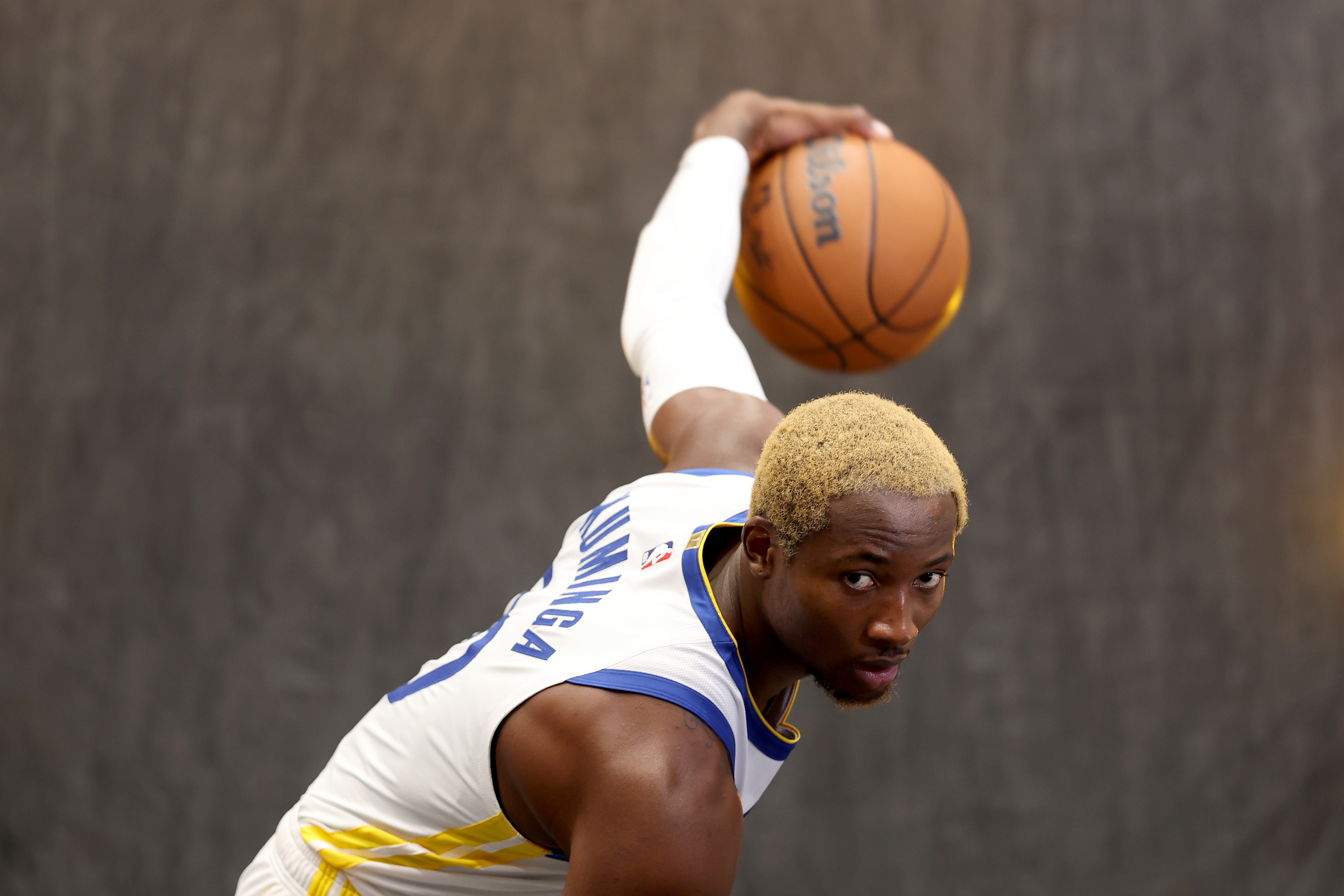 Golden StJonathan Kuminga #00 of the Golden State Warriors poses for the media during the Warriors Media Day at Chase Center on September 30, 2024 in San Francisco, California.&nbsp;ate Warriors Media Day