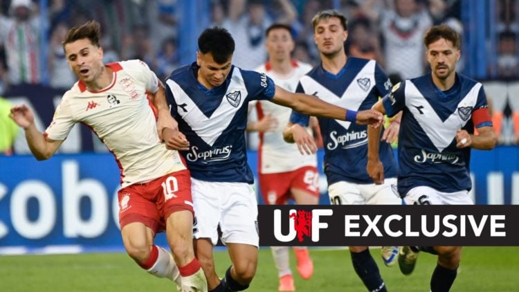 Walter Mazzantti, a Huracan player, contests the ball with Christian Ordonez, a Velez Sarsfield player, during the final match. Overlaid, an exclus...