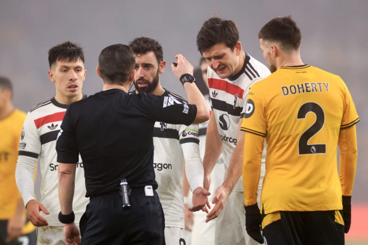 Bruno Fernandes of Manchester United  reacts as he is sent off after being shown a red card by Referee Tony Harrington during the Premier League ma...