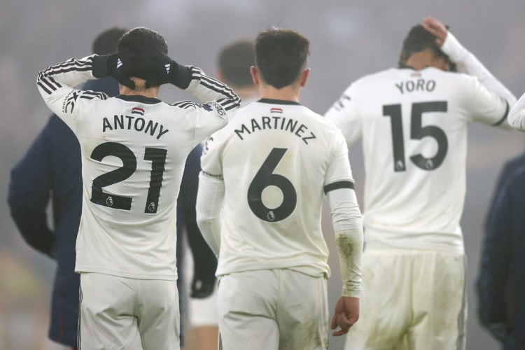 A dejected Antony, Lisandro Martinez and Leny Yoro of Manchester Utd after the 2-0 loss during the Premier League match between Wolverhampton Wande...