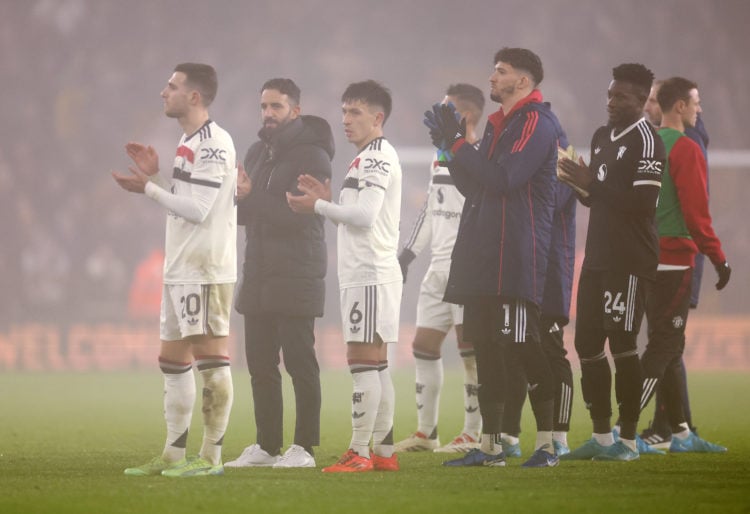 Ruben Amorim, Manager of Manchester United and his players show appreciation to the fans following a loss in the Premier League match between Wolve...