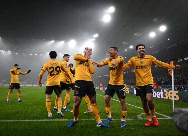 Matheus Cunha of Wolverhampton Wanderers celebrates scoring his team's first goal with teammates during the Premier League match between Wolverhamp...