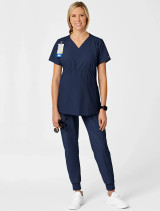 Full body view of the women's Wink W123 maternity scrub top  #4555 in navy.