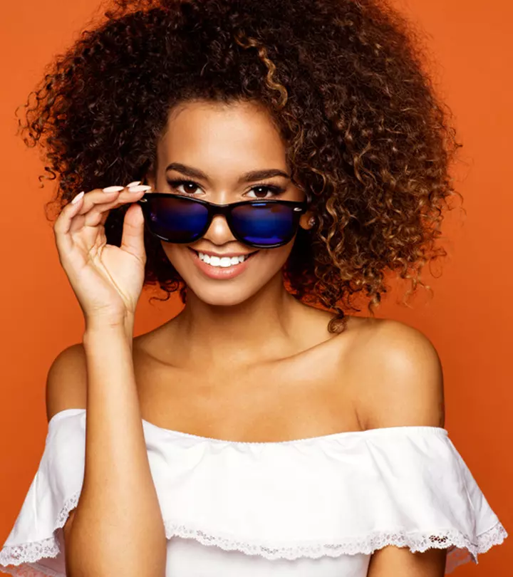 Use these hair care essentials to quickly tame the frizz of your coils and define them well.