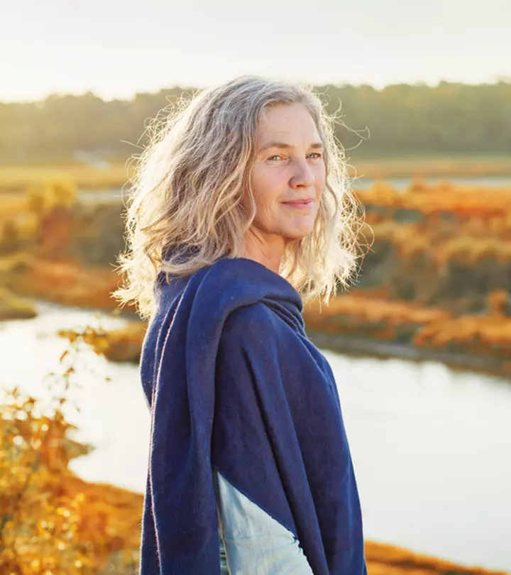 Woman Applying Olive Oil For Grey Hair