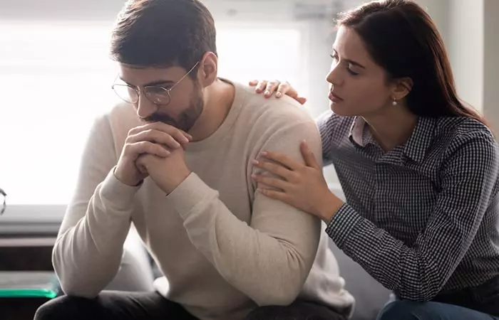 Wife comforting and supporting disappointed husband 