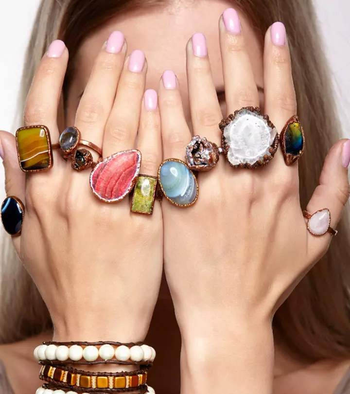 Person Cleaning Fake Jewelry