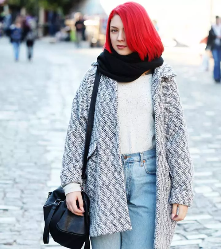 Woman Wearing Boyfriend Jeans In A Stylish Outfit