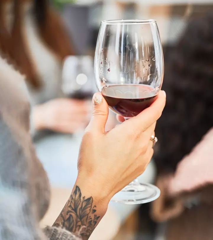 Here’s what you need to know about mixing alcohol and tattoos before you toast your new ink.