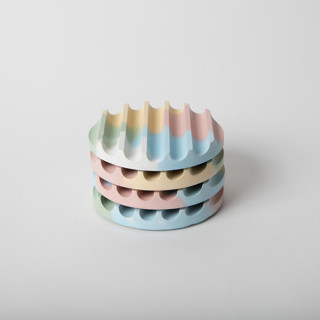 This is a multicolor tableware by Pretti.Cool called jawbreaker coasters (set of 4) in standard