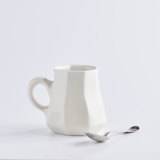 This is a white tableware by Lauren Herzak Bauman called formation mug in frost white in standard