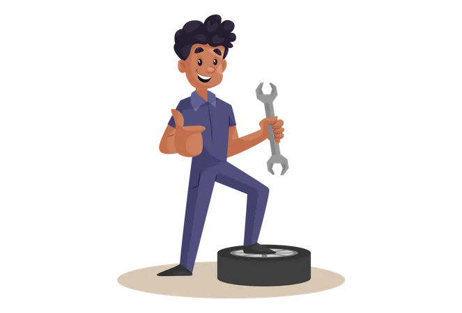 Indian Mechanic repairing wheel with wrench  イラスト