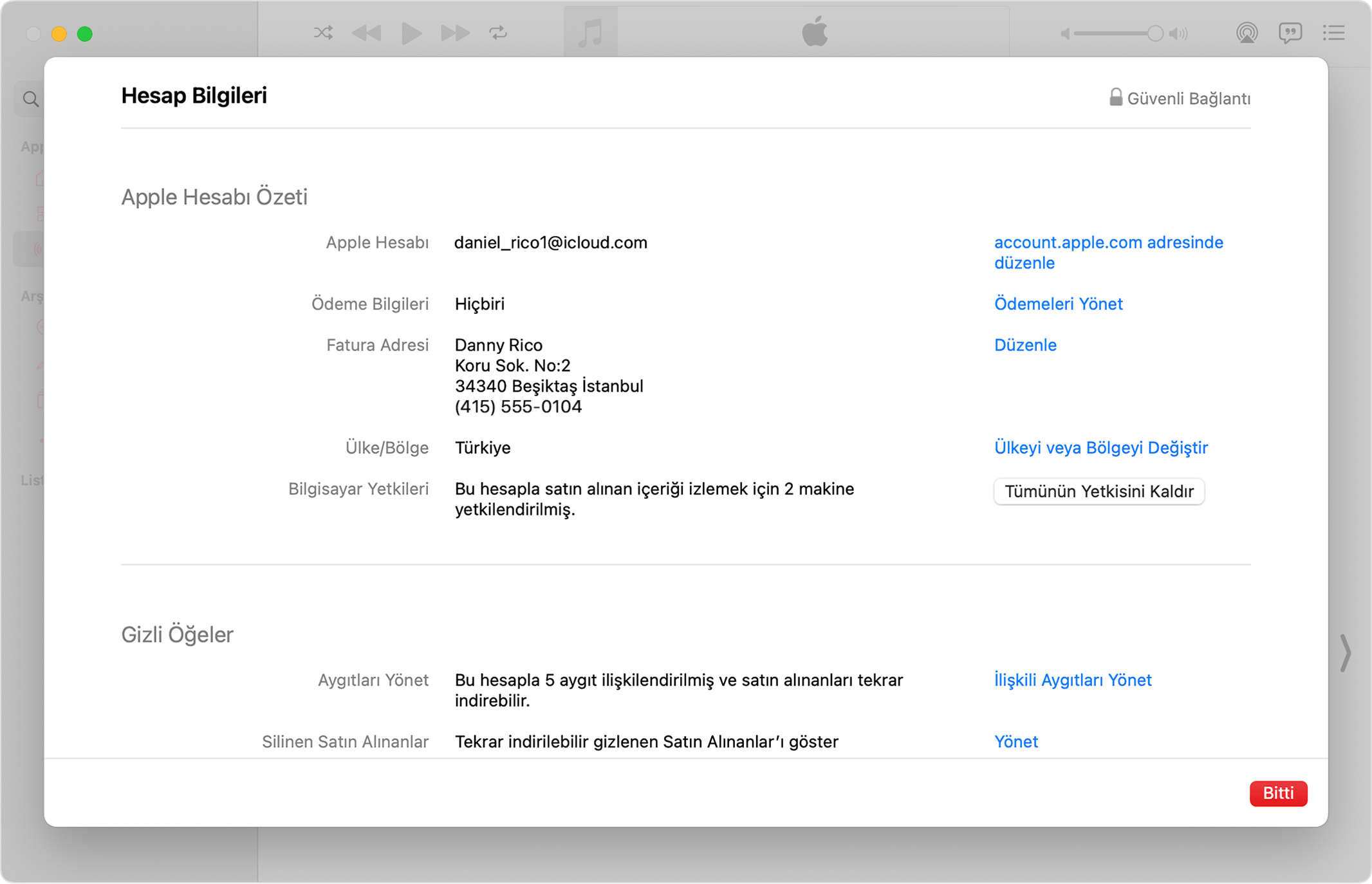 Mac'te Hesap Bilgileri sayfasının ve yetkili bilgisayar sayısının gösterildiği Apple Music uygulaması