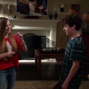 Still of Courtney Grosbeck and Nolan Gould in Modern Family (2013).