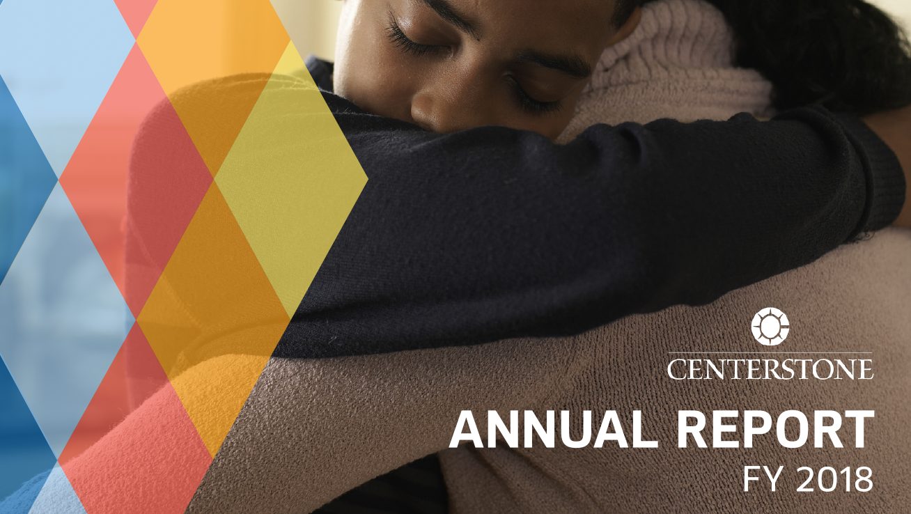 FY2020 annual report cover photo featuring preteen boy hugging adult woman