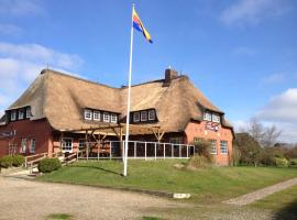 Inselhotel Kapitän Tadsen / Amrum, hotel din Nebel