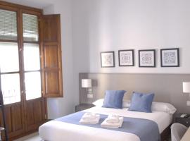 La Perla Granada Suites, hostal o pensión en Granada