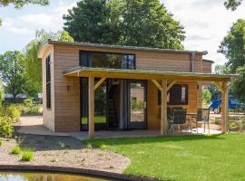 Fraai Tiny House aan het veluwemeer met uitzicht & veranda、フルスホルストのホテル