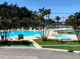 Apartamento até 10 pessoas na enseada Guarujá em condomínio clube praia piscinas salão jogos quadra futebol campo parquinho brinquedos Wi-fi Home office, kuurort sihtkohas Guarujá