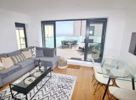 Modern Home for Small Groups by Stones Throw Apartments - Free Parking - Sea View