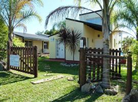 Los Palmares Del Urugua-i Bungalows, hotel in Colón