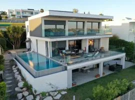 Modern Villa with Sea & River View Pool and Gym.