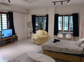 5-Person 1950s Shophouse: Vintage Charm & Smart TVs