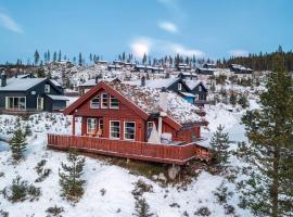 Cozy cabin with sauna, ski tracks and golf outside, hotell i Gol