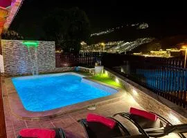 Villa Puerto Rico in front of the shopping center with private heated saltwater pool with jacuzzi & arcade games & t able foot ball