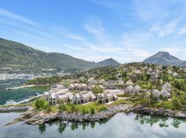 Modern house by the Fjord in Sandane, Nordfjord., rumah liburan di Sandane