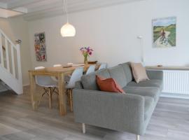 Jonas - Luxe appartement naast de duinen, loma-asunto kohteessa Oosterend