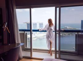 Swissotel The Stamford Singapore, хотел в Сингапур