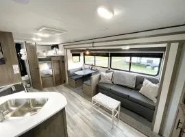 RV located on private property, providing access to the Guadalupe River, accommodates up to 5 guests