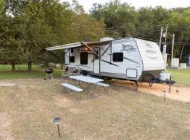 RV located on private property, providing access to the Guadalupe River, accommodates up to 4 guests